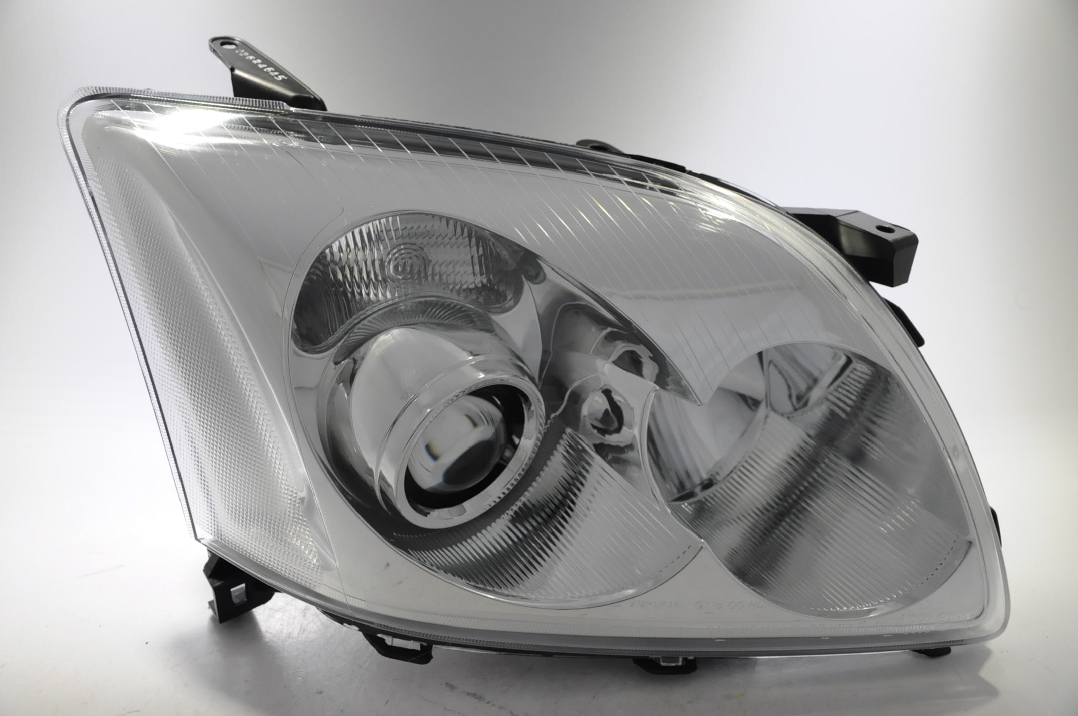 TOYOTA AVENSIS 2003-06 REFLEKTOR PRAWY NOWY DEPO ^ Strona zabudowy prawa