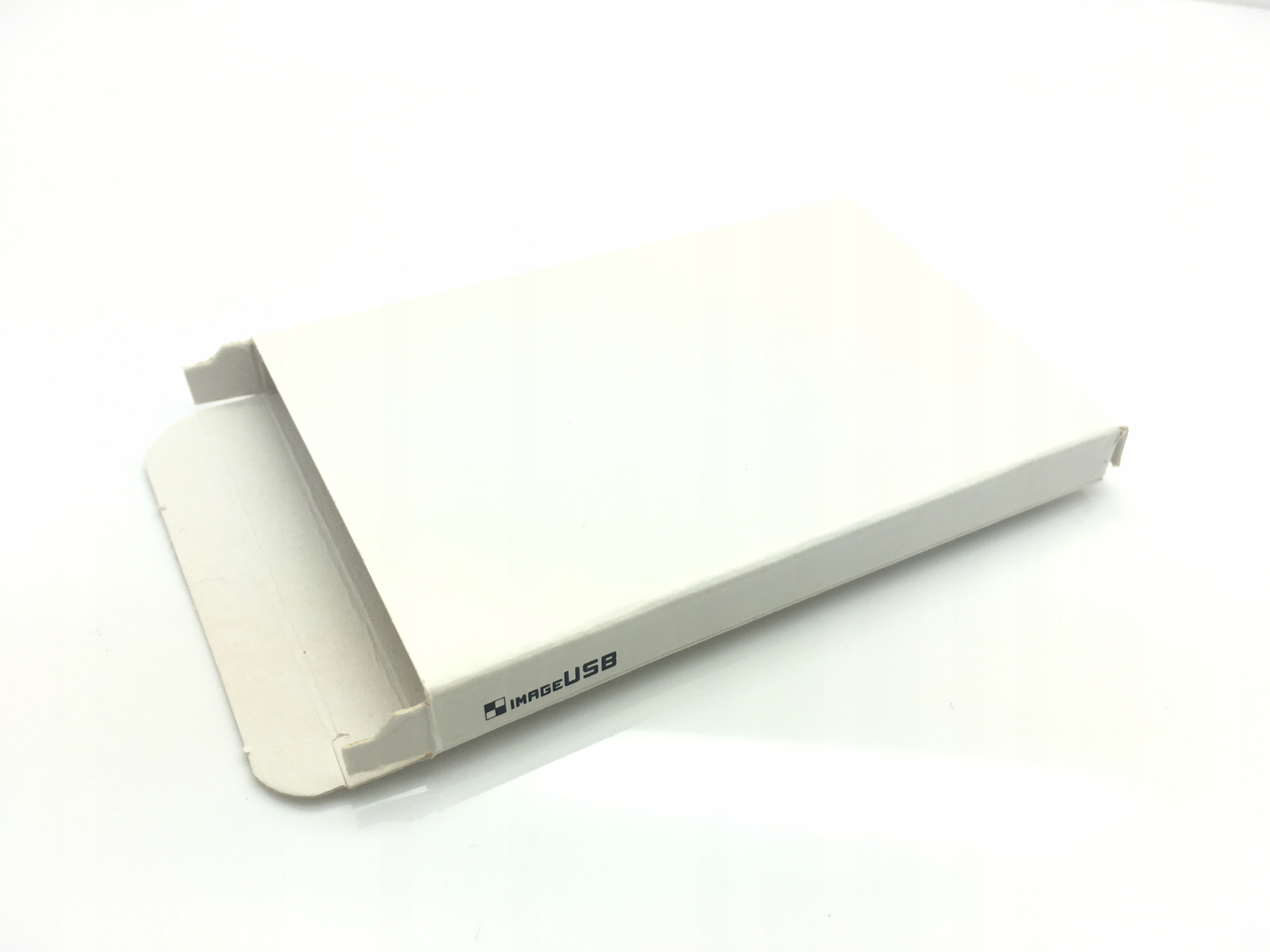 

płaskie pudełko kartonik na produkt Usb karta