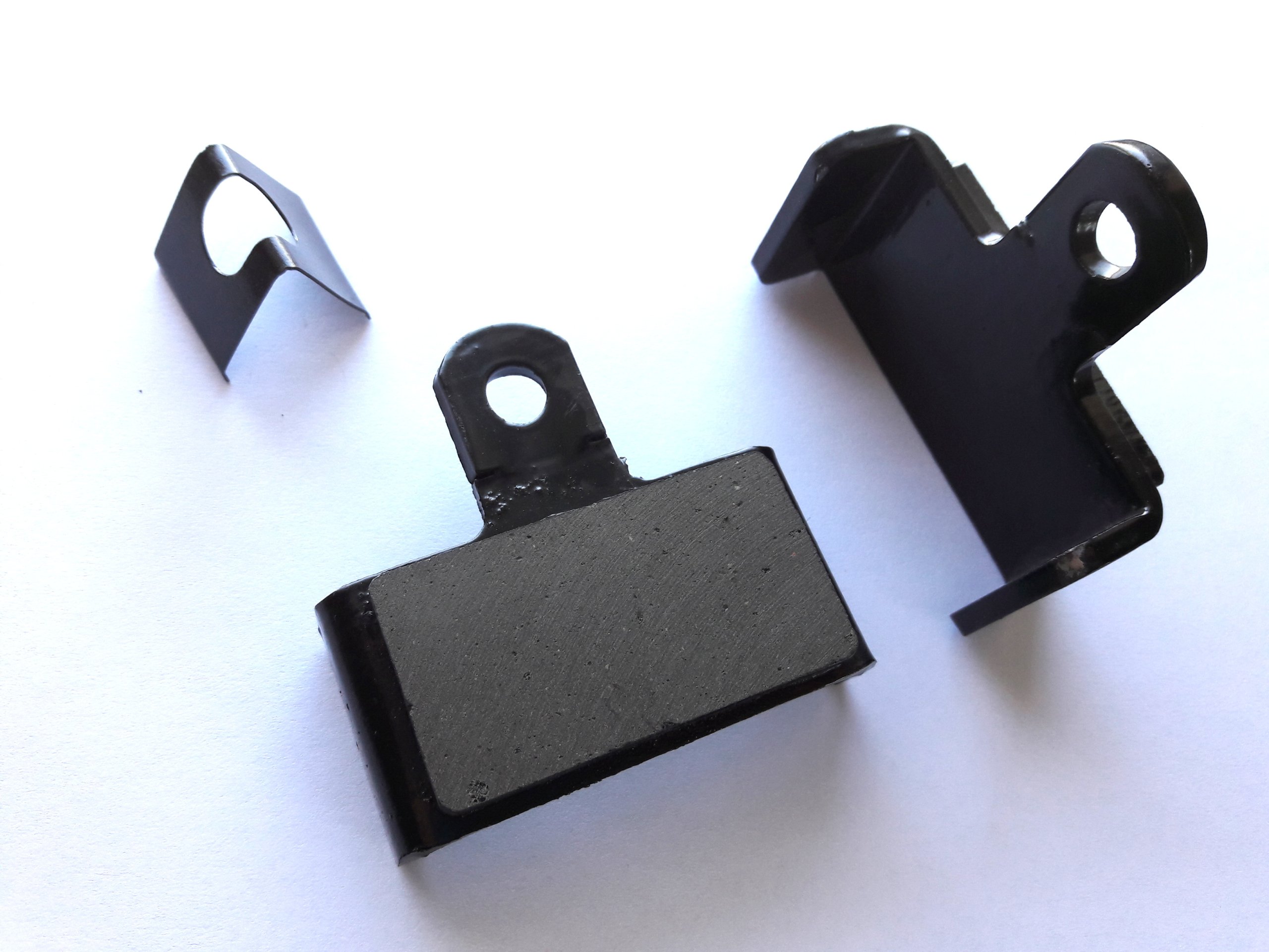 CAT 428B KOMPLET KLOCKOW HAMULCOWYCH BLASZKA