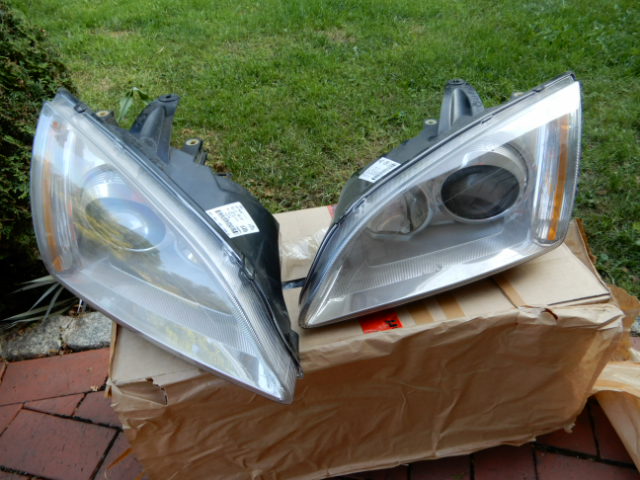 2 nowe lampy soczewkowe skrętne Ford Focus MK2