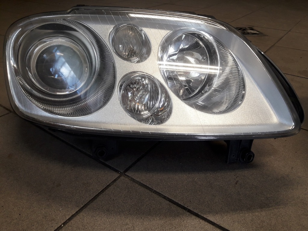 lampa przednia bi xenon VW TOURAN lewa EUROPA 1T