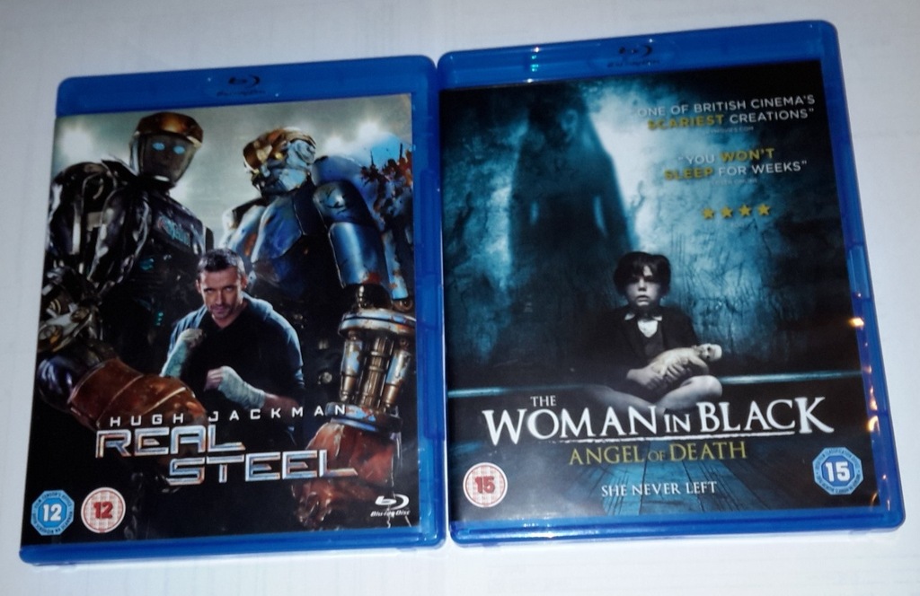 THE WOMAN IN BLACK. REAL STEEL. 2 FILMY.