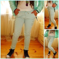 MIĘTOWE SPODNIE DRESY KORONKA Z DZIURAMI 116-122