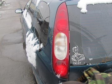 Kia clarus фара ліва задня, фото