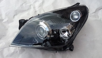 Lampa przód Opel Astra 3 Lift III lewa xenon skrętny 1ZS008710
