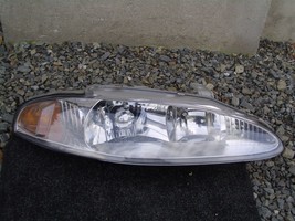 REFLEKTOR PRAWY MITSUBISHI ECLIPSE 95-