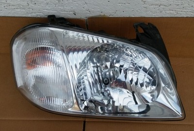 Фара правый лампа правая mazda tribute 2001- фото №1