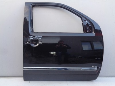 Двері праве передні nissan navara d40 pathfinder фото №1