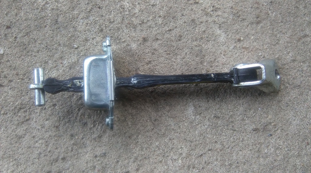 фото №1, Nissan pixo обмежувач лівий задня